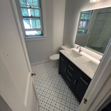 New bathroom floor, vanity and lighting