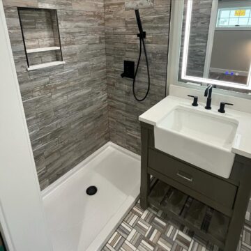 New bathroom with added shower and updated layout